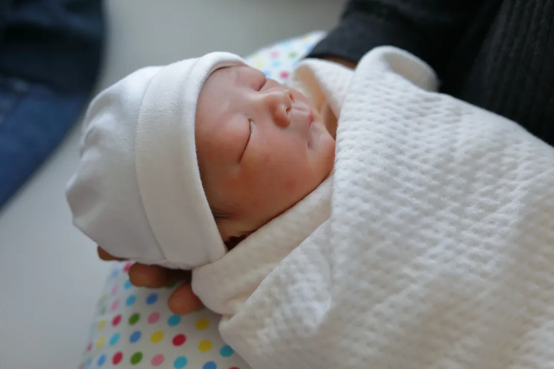 Swaddled sleeping baby